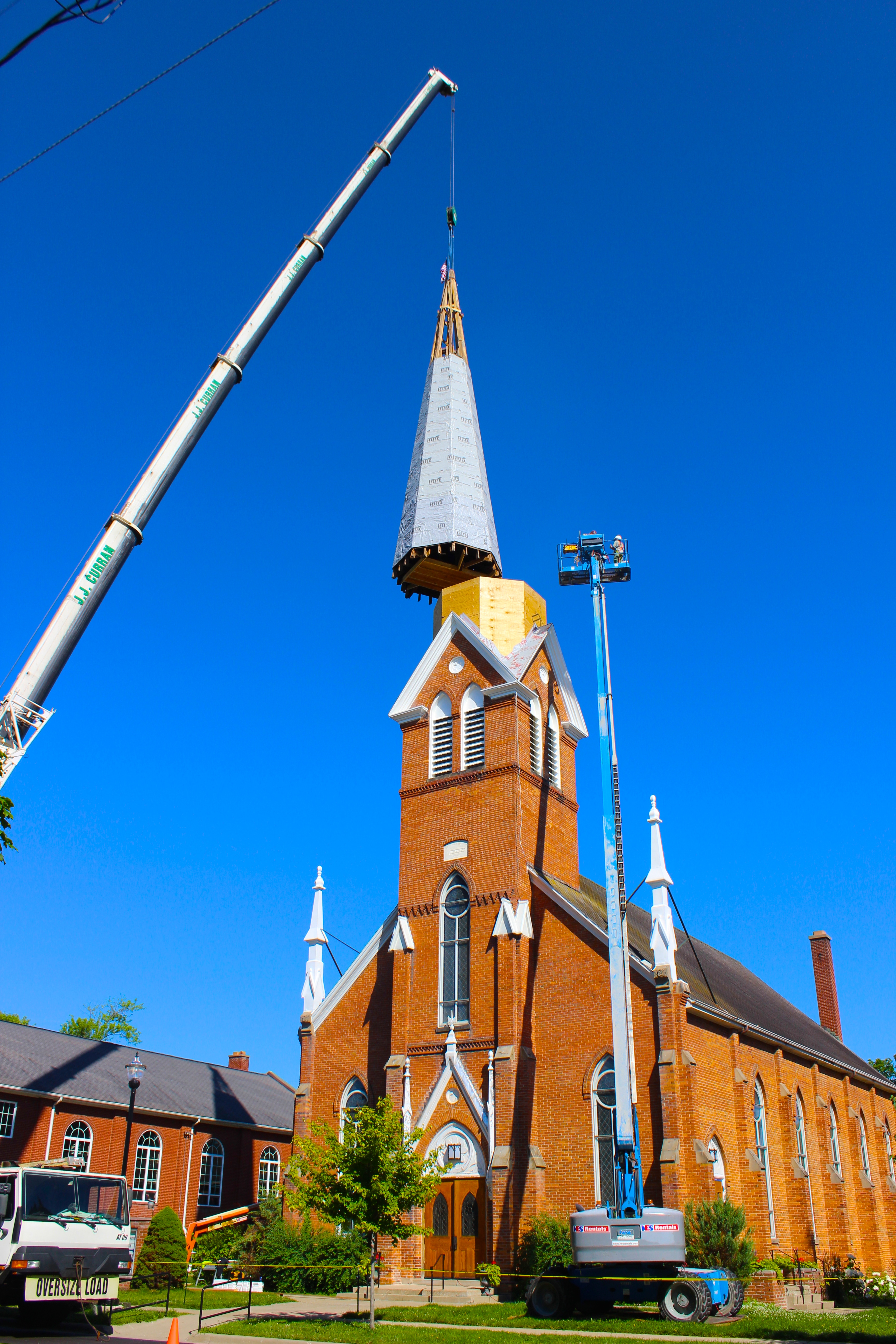 church steeple tower repairs proceed returns structure manchester