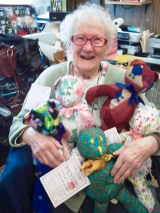 Shirley holding a few of her bears. Photo courtesy of Christine Baisden.