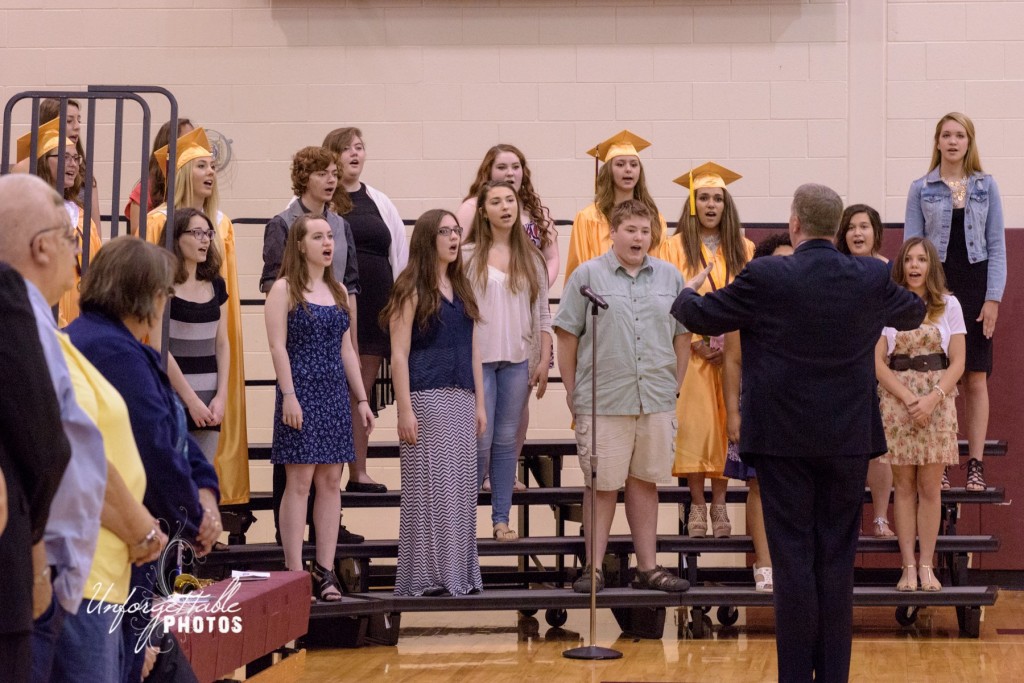 The MHS Choir, directed by Jared Throneberry, sings the National Anthem.