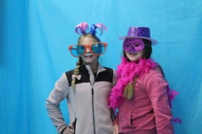 Students pose in the photo booth by Lifetouch