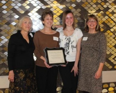 Stacy Oberleiter and her daughter KaylaOberleiter, second and third from left, are the 2013 Community Resource Center nominees. 