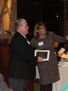 Ray Kemner, left, accepts the Service to Youth Award