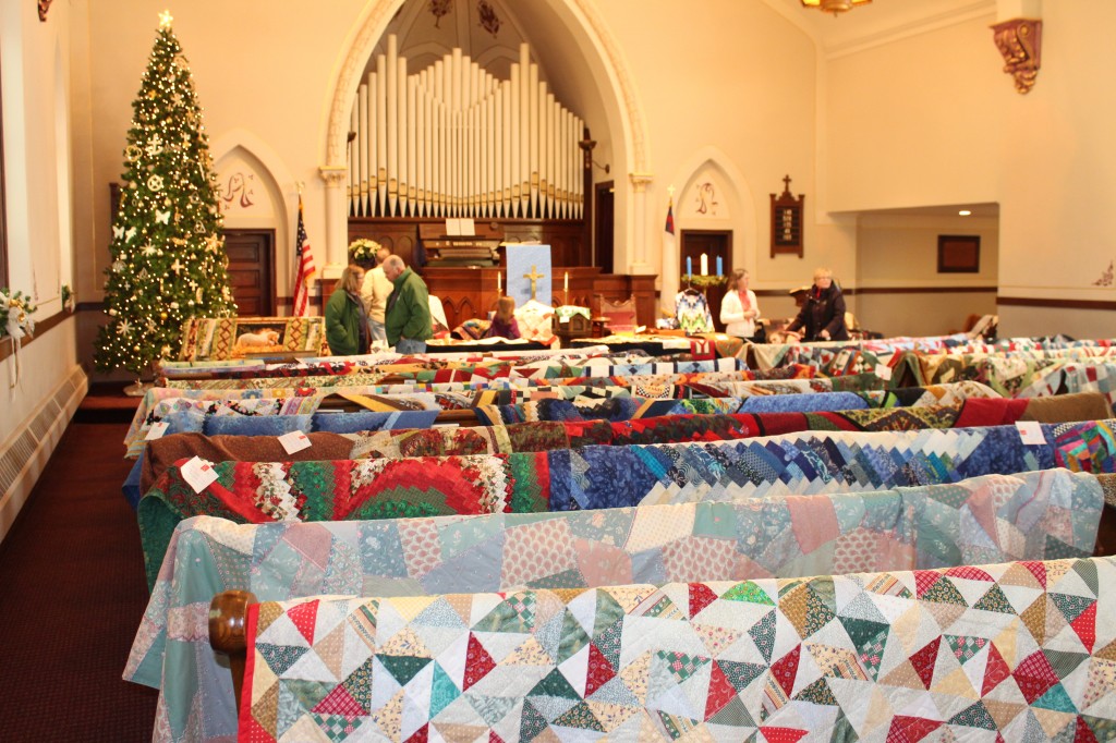 Guests admire the quilts in the sanctuary.