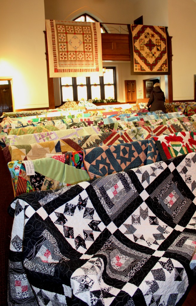 Quilts adorn every pew in the sanctuary.