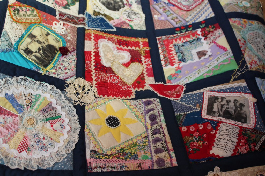 Beautiful memory quilt, can you see the photographs?