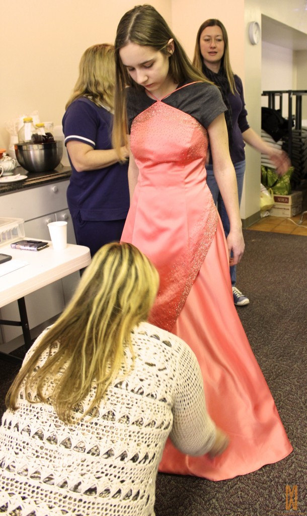talented seamstress Nina Tyner performed major and minor alterations on dresses   while girls waited 