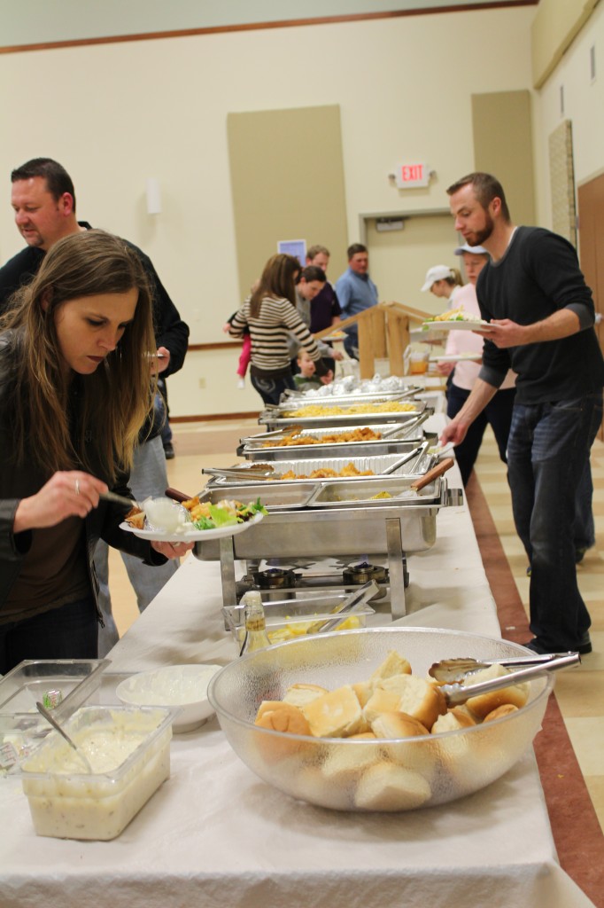 A salad bar, baked potatoes, mac & cheese, fish, bread, and dessert (now shown) are all options during this all-you-can-eat meal.  