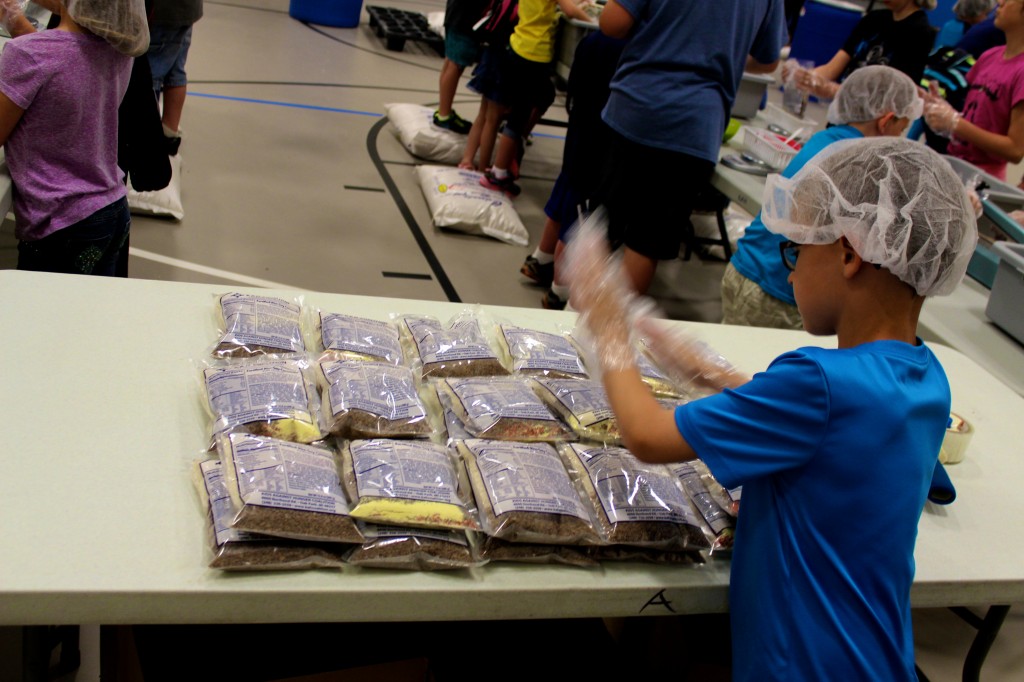Each meal is bagged and stacked, waiting to be boxed for shipping.