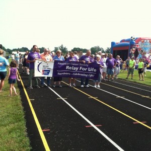 A sea of purple shirts, each one representing a cancer survivor, began Manchester's fourth annual Relay For Life on June 28.