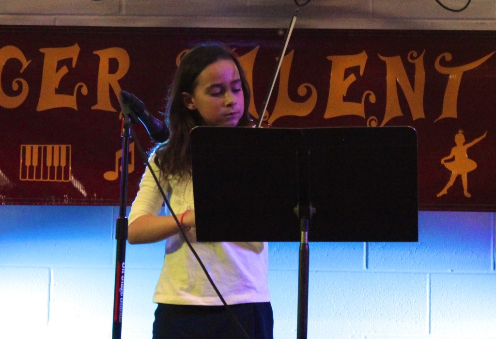 Josi Castillo-Miller played Song of the Wind on the violin accompanied by her brother Javi on the piano.