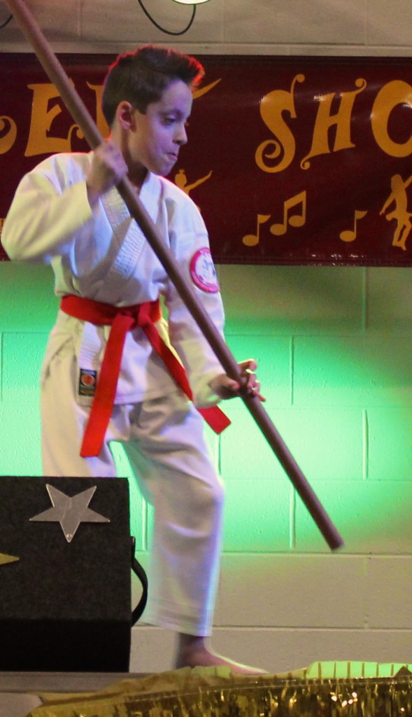Logan Kippnick performed karate moves to Honoka Japanese Drumming. 