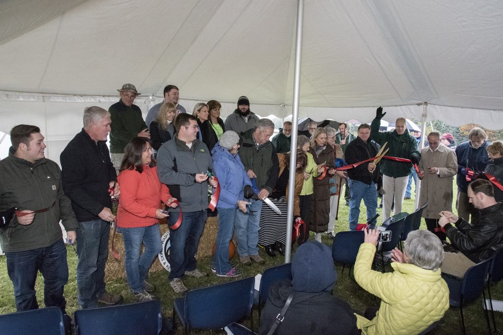 Ribbon cutting. Photo courtesy of Harry Sabourin.